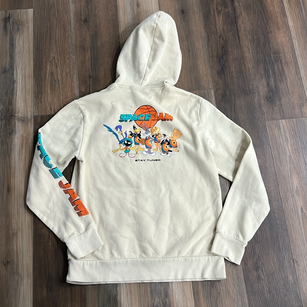 Space jam, pull over a hoodie